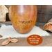 This shows the back of the pumpkin gourd that I engraved Archey's name into the shell using pyrography pens. 